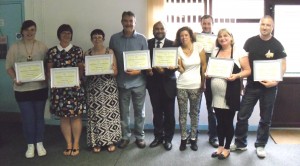 CCA Volunteers receiving their Certificates of Appreciation with the Chairman